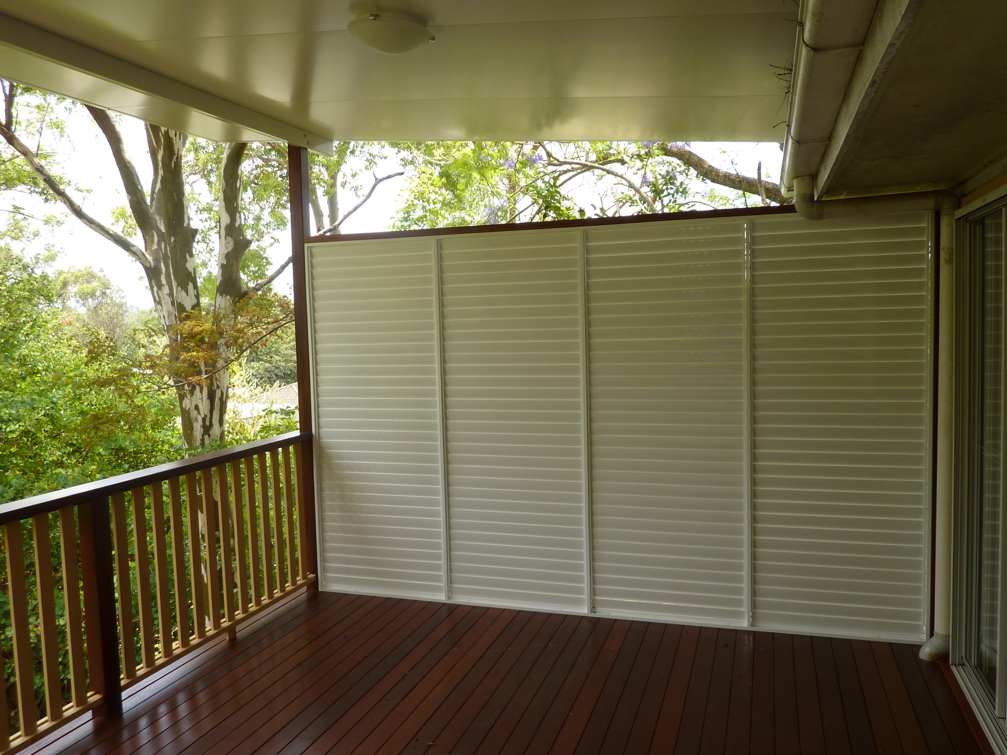 A deck with a built in privacy screen