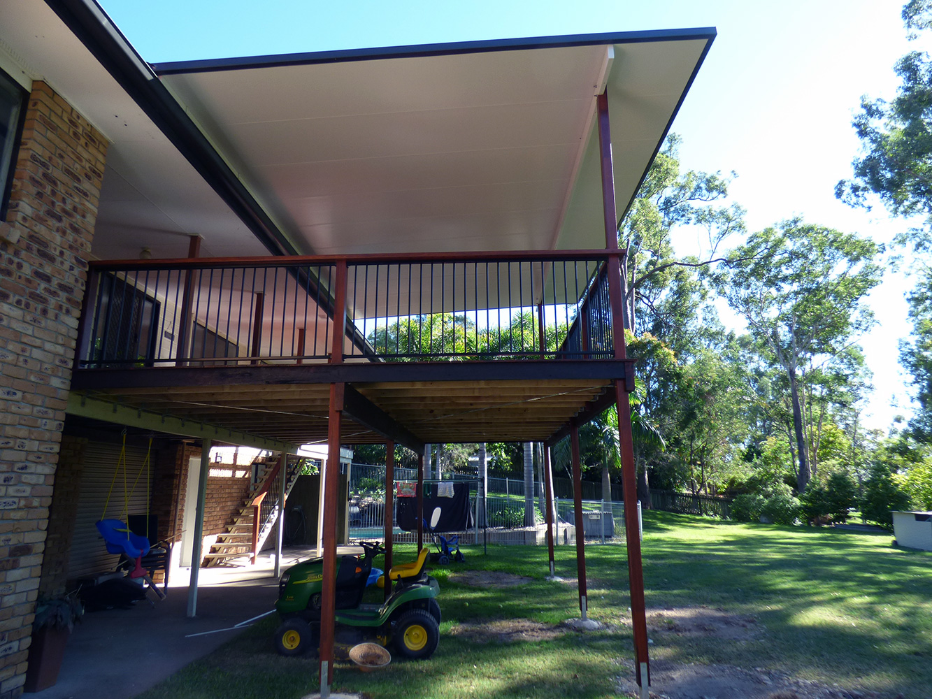 Internal patio deck stairs. Flat top hand rail.