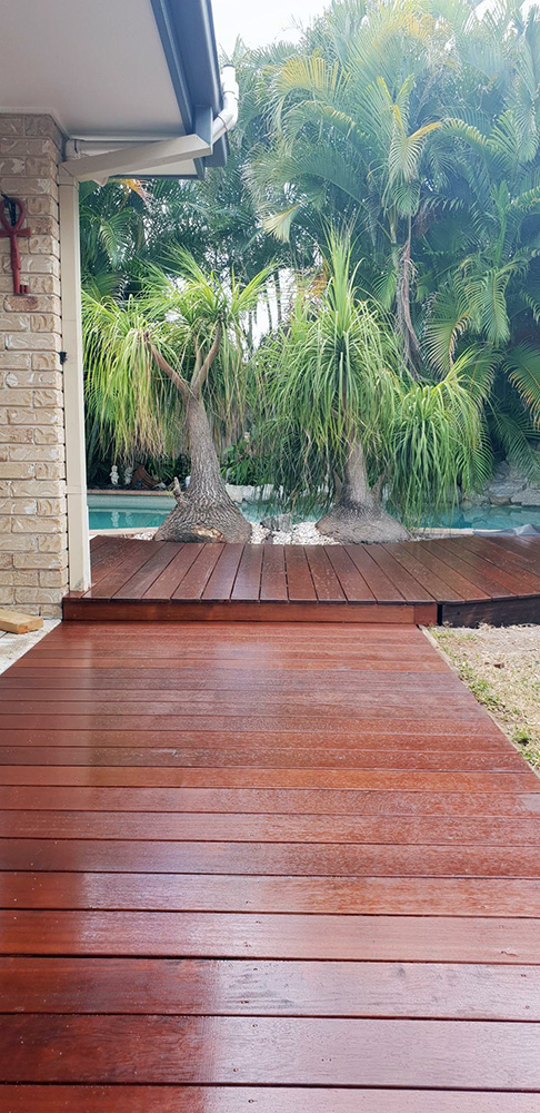 Ground level deck around a pool. Hoist protection and 3 coats of a breathable sealant for protection from the sun and pool chemicals.
