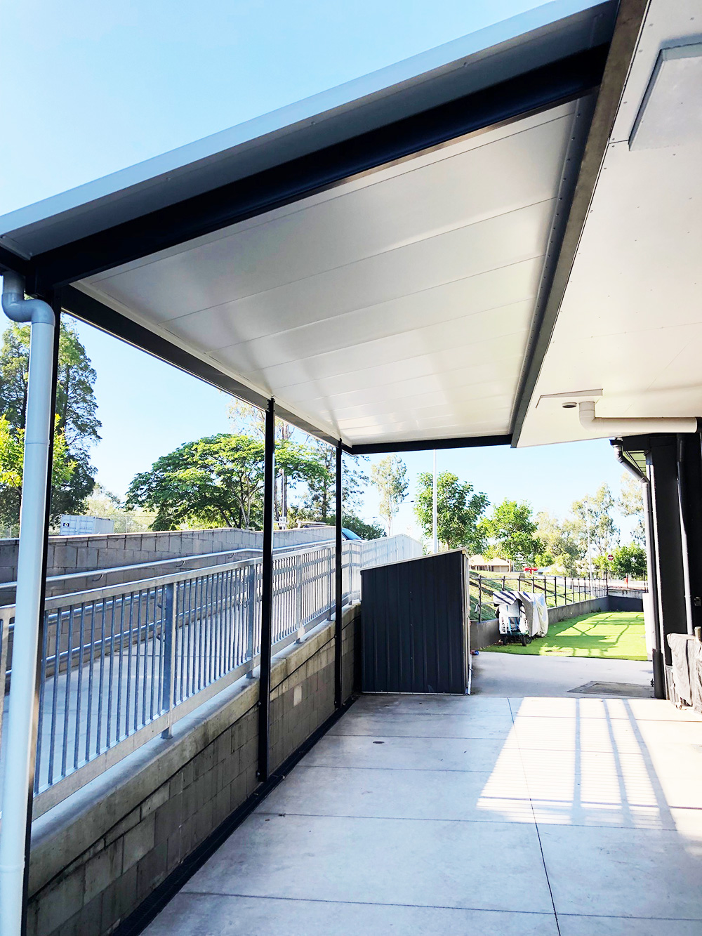 Skillion patio down side of house